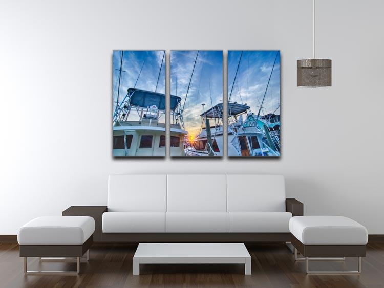 A beautiful 3-panel canvas print depicting sportfishing boats at a marina during early morning, showcasing vibrant colors and serene water reflections.