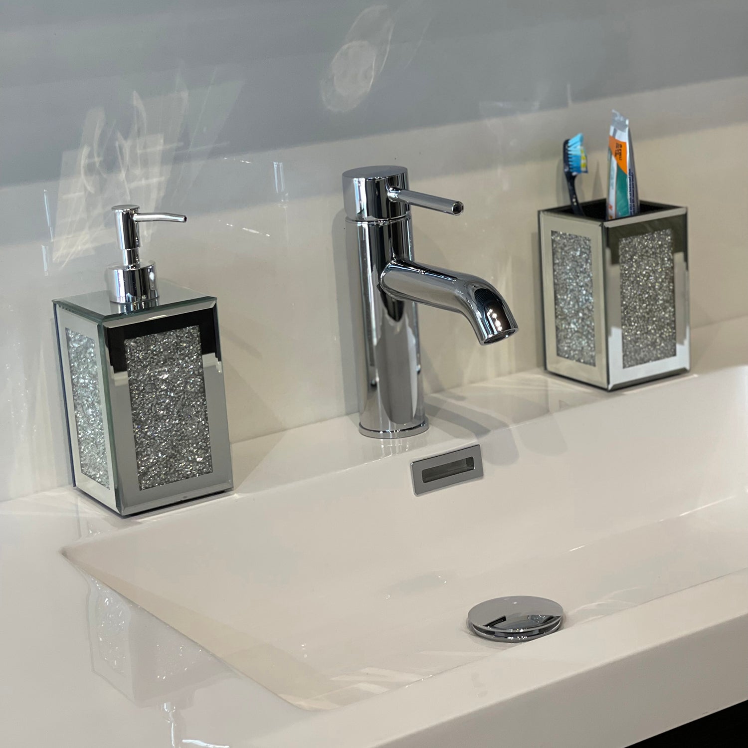 Square soap dispenser and toothbrush holder set in silver with crushed diamond glass and chrome accents, elegantly packaged in a gift box.