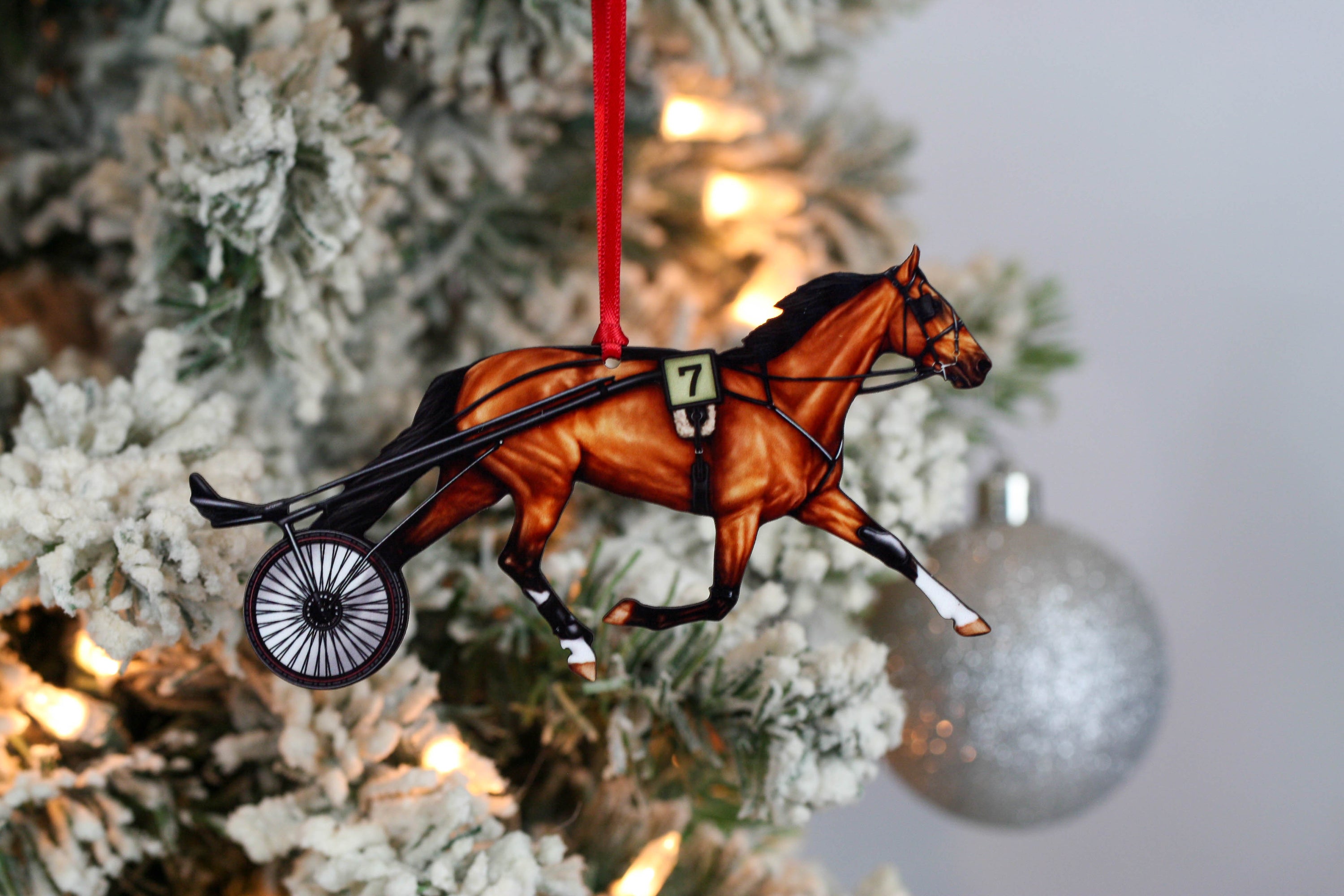 Handmade bay Standardbred Racehorse ornament made from composite wood, featuring a glossy printed front and dark brown back, perfect for holiday decor.