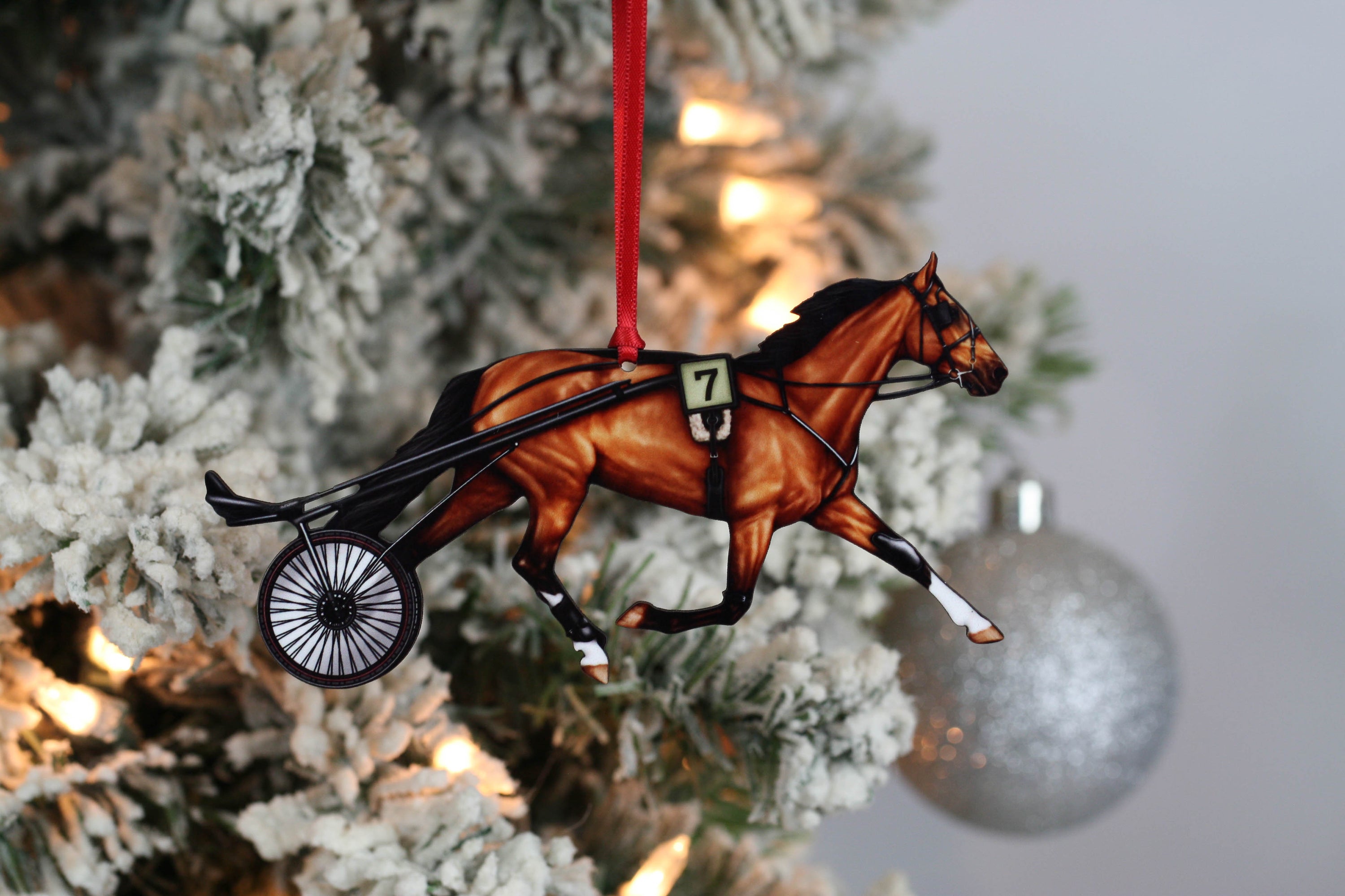 Handmade bay Standardbred Racehorse ornament made from composite wood, featuring a glossy printed front and dark brown back, perfect for holiday decor.