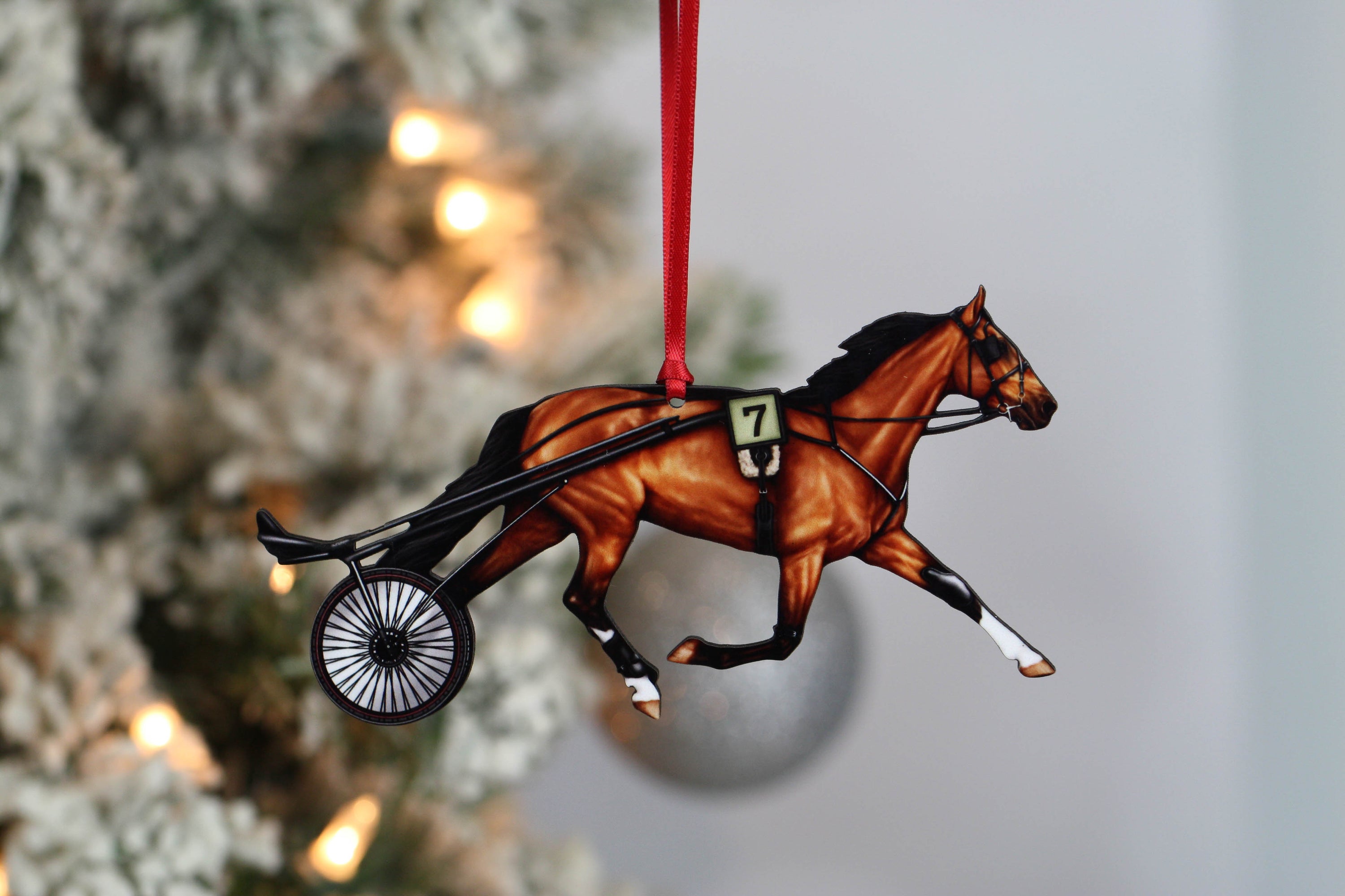 Handmade bay Standardbred Racehorse ornament made from composite wood, featuring a glossy printed front and dark brown back, perfect for holiday decor.