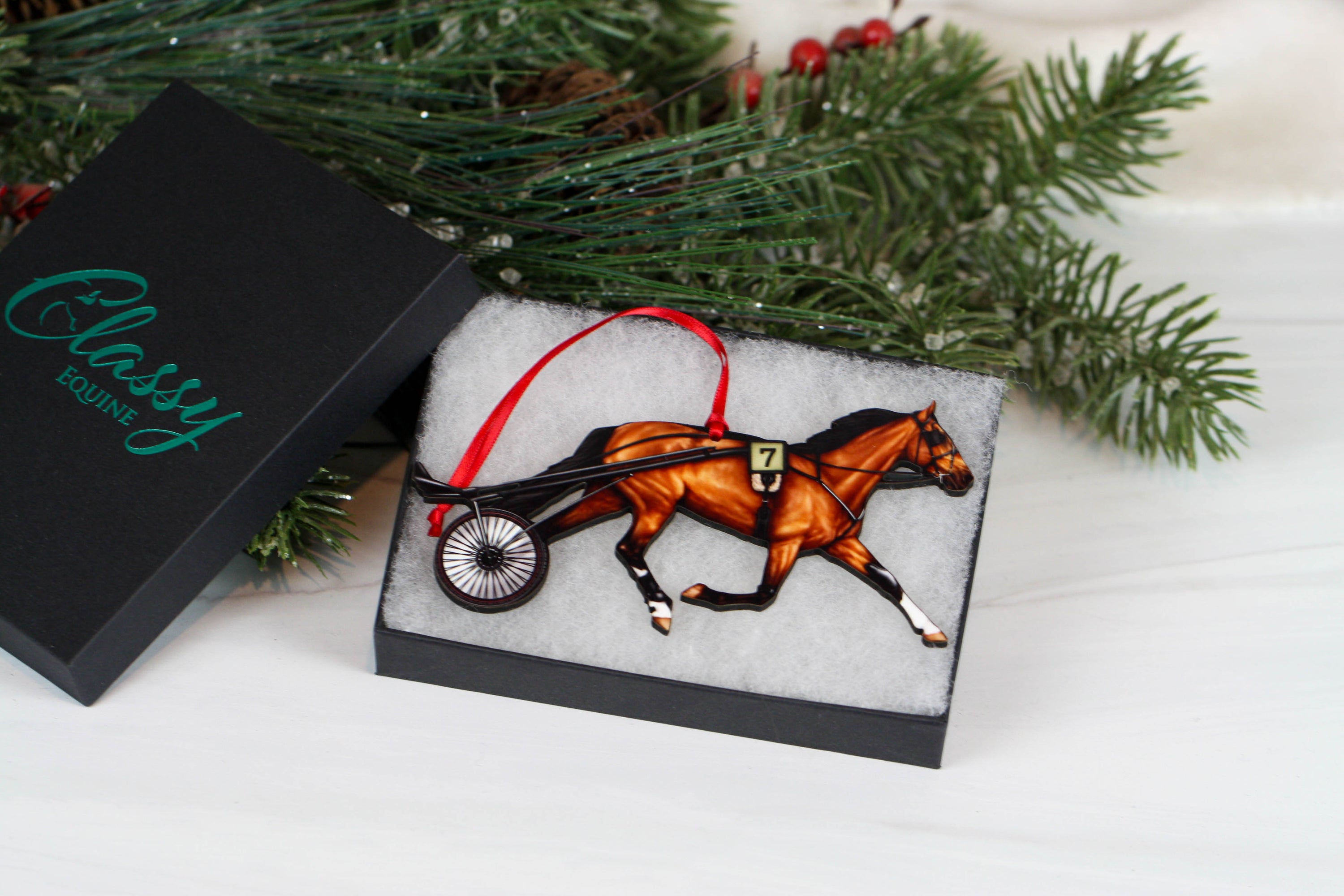 Handmade bay Standardbred Racehorse ornament made from composite wood, featuring a glossy printed front and dark brown back, perfect for holiday decor.