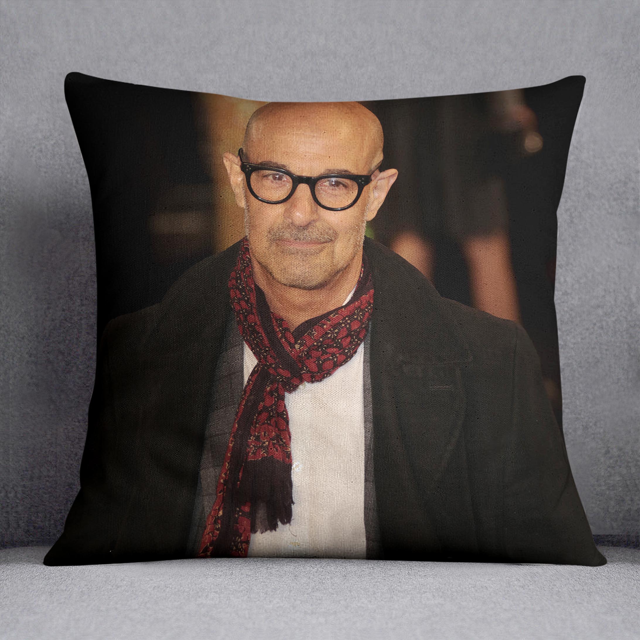 A vibrant Stanley Tucci Cushion featuring abstract designs on luxurious vegan faux suede, perfect for home decor.
