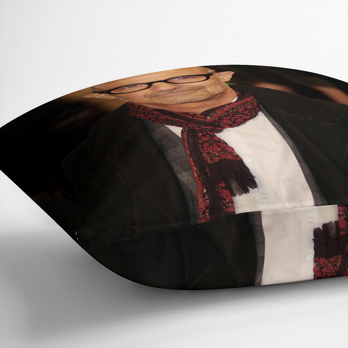 A vibrant Stanley Tucci Cushion featuring abstract designs on luxurious vegan faux suede, perfect for home decor.