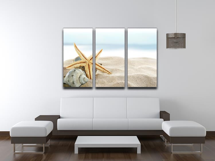 A beautiful 3-panel canvas print featuring starfish on a sandy beach, showcasing vibrant colors and intricate details.