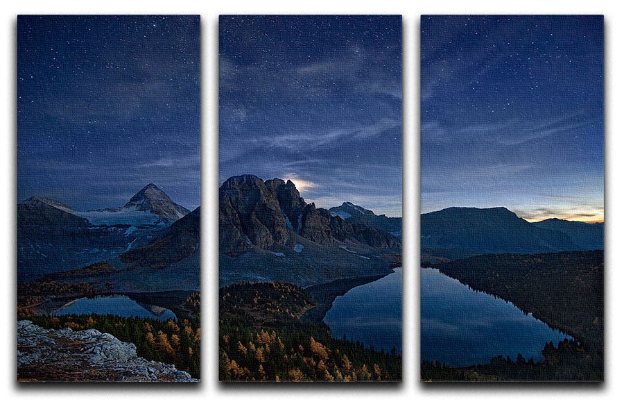Starry Night At Mount Assiniboine 3-panel canvas print showcasing a beautiful night sky over a mountain landscape.