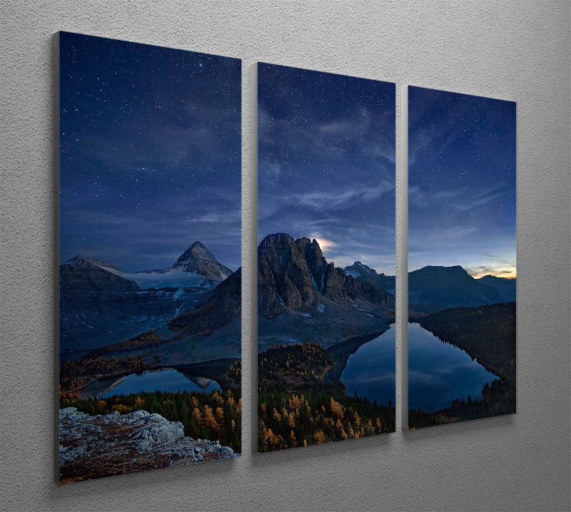 Starry Night At Mount Assiniboine 3-panel canvas print showcasing a beautiful night sky over a mountain landscape.
