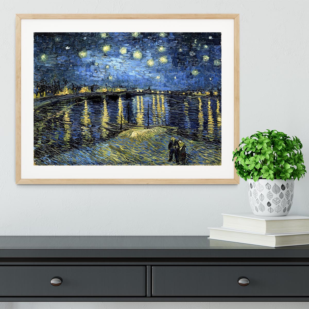 Framed print of Starry Night over the Rhone by Van Gogh, showcasing vibrant colors and elegant handmade frame.