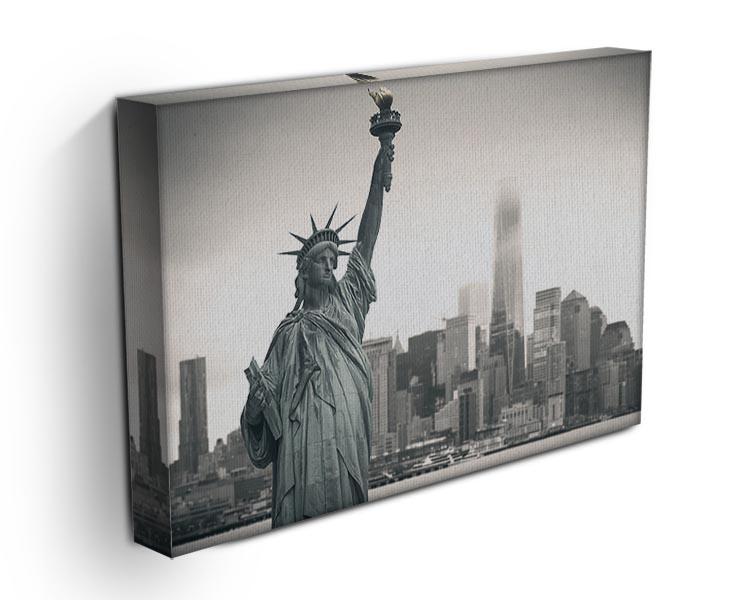 A vibrant canvas print of the Statue of Liberty with a cityscape backdrop, showcasing iconic architecture and a beautiful skyline.