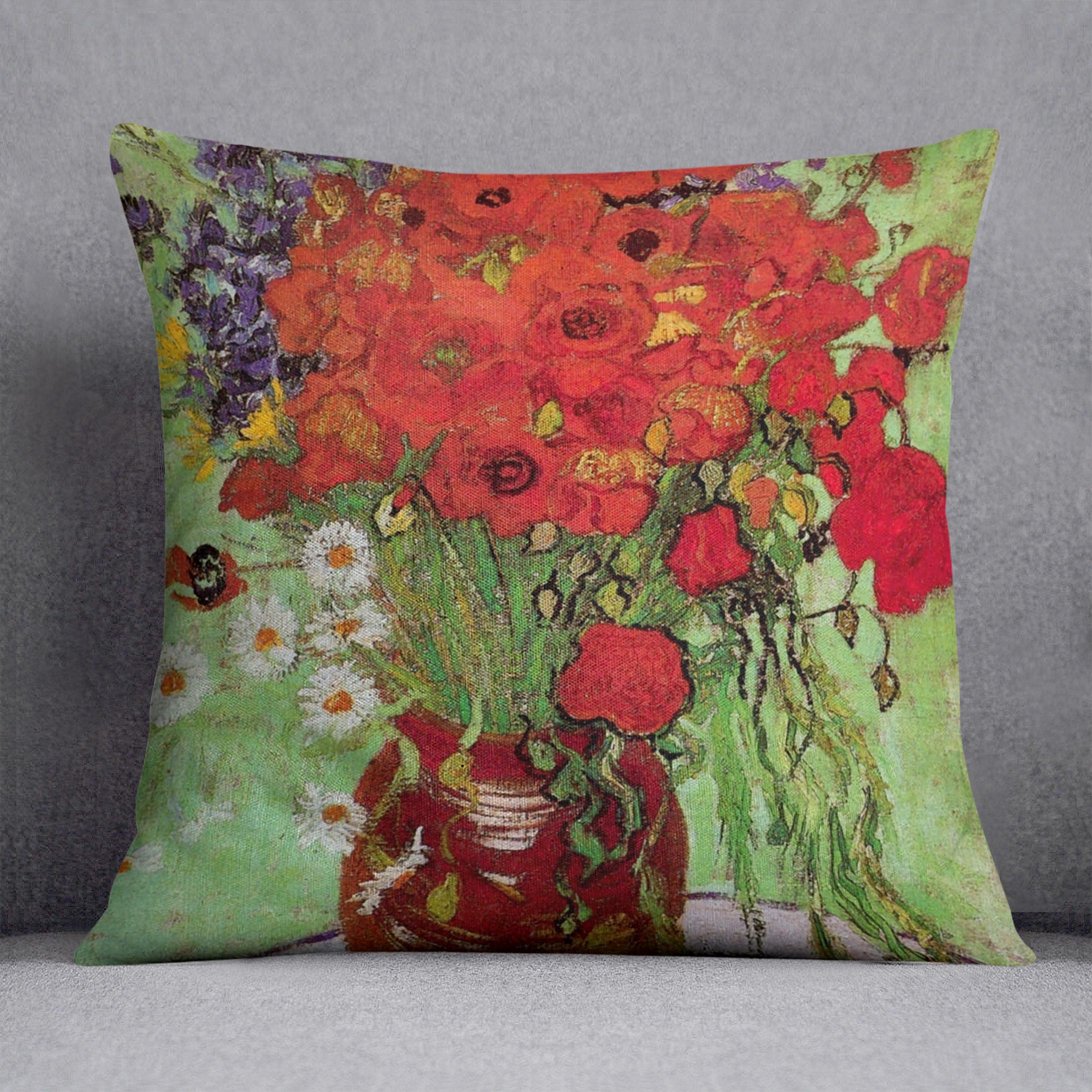 A vibrant cushion featuring Van Gogh's Still Life Red Poppies and Daisies design, made from luxurious vegan faux suede.