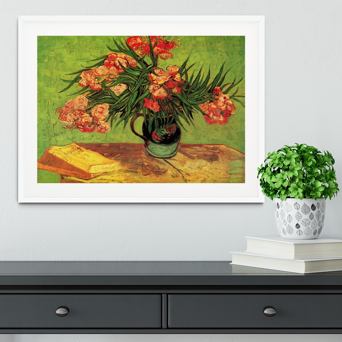 Framed print of Van Gogh's Still Life Vase with Oleanders and Books, showcasing vibrant colors and intricate details.