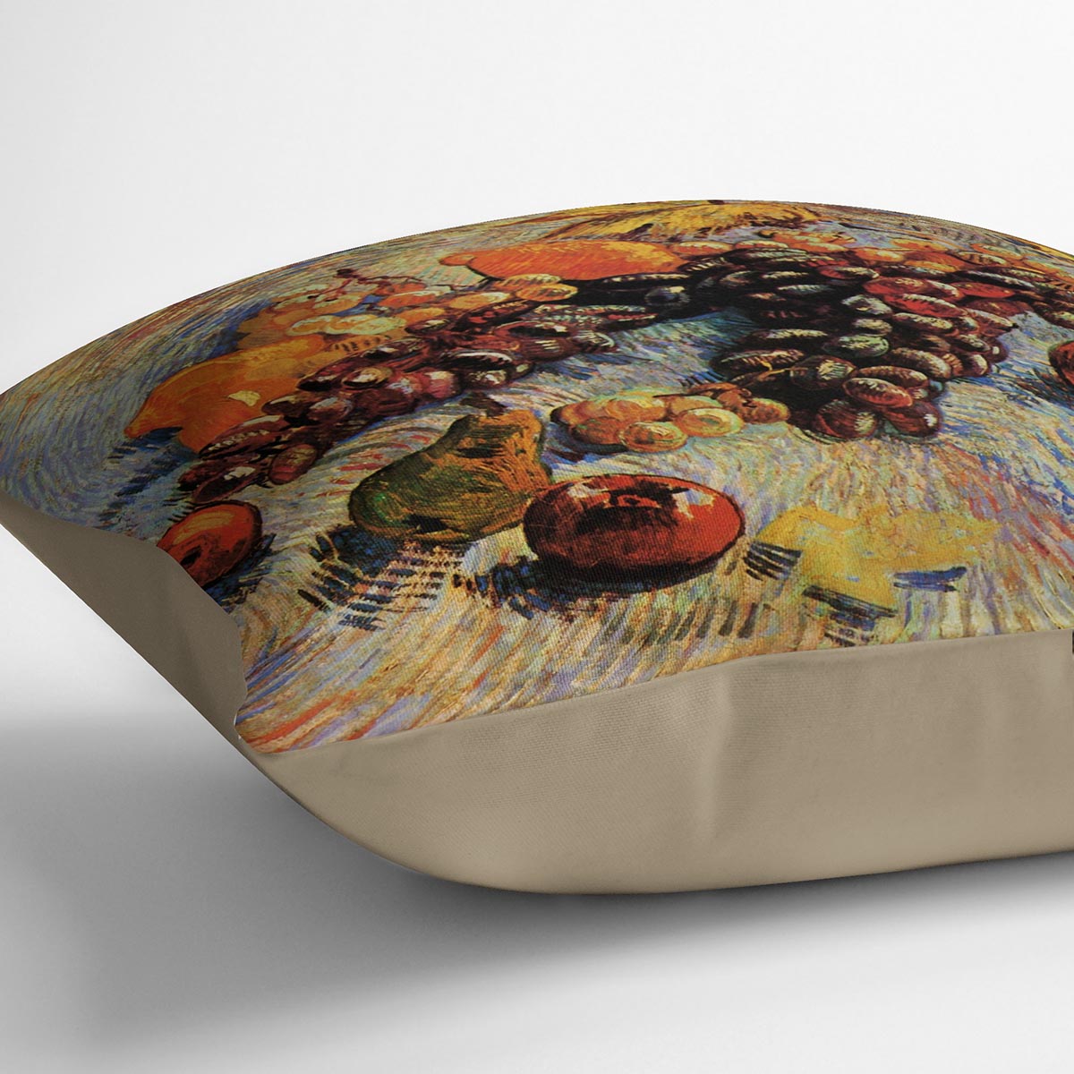 A vibrant cushion featuring Van Gogh's Still Life with Apples, Pears, Lemons, and Grapes, made from luxurious vegan faux suede.