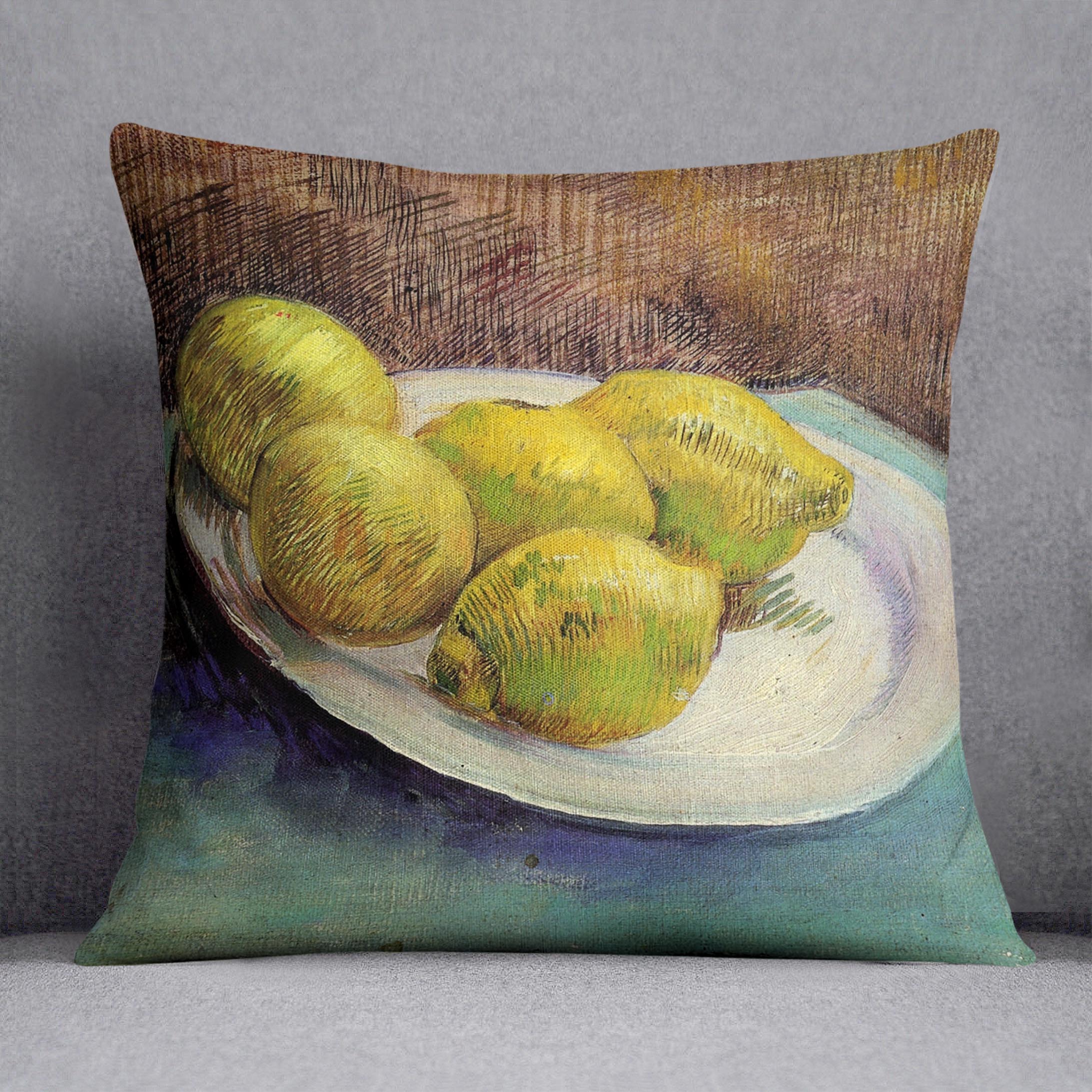 A vibrant cushion featuring Van Gogh's Still Life with Lemons on a Plate design, made from luxurious vegan faux suede.