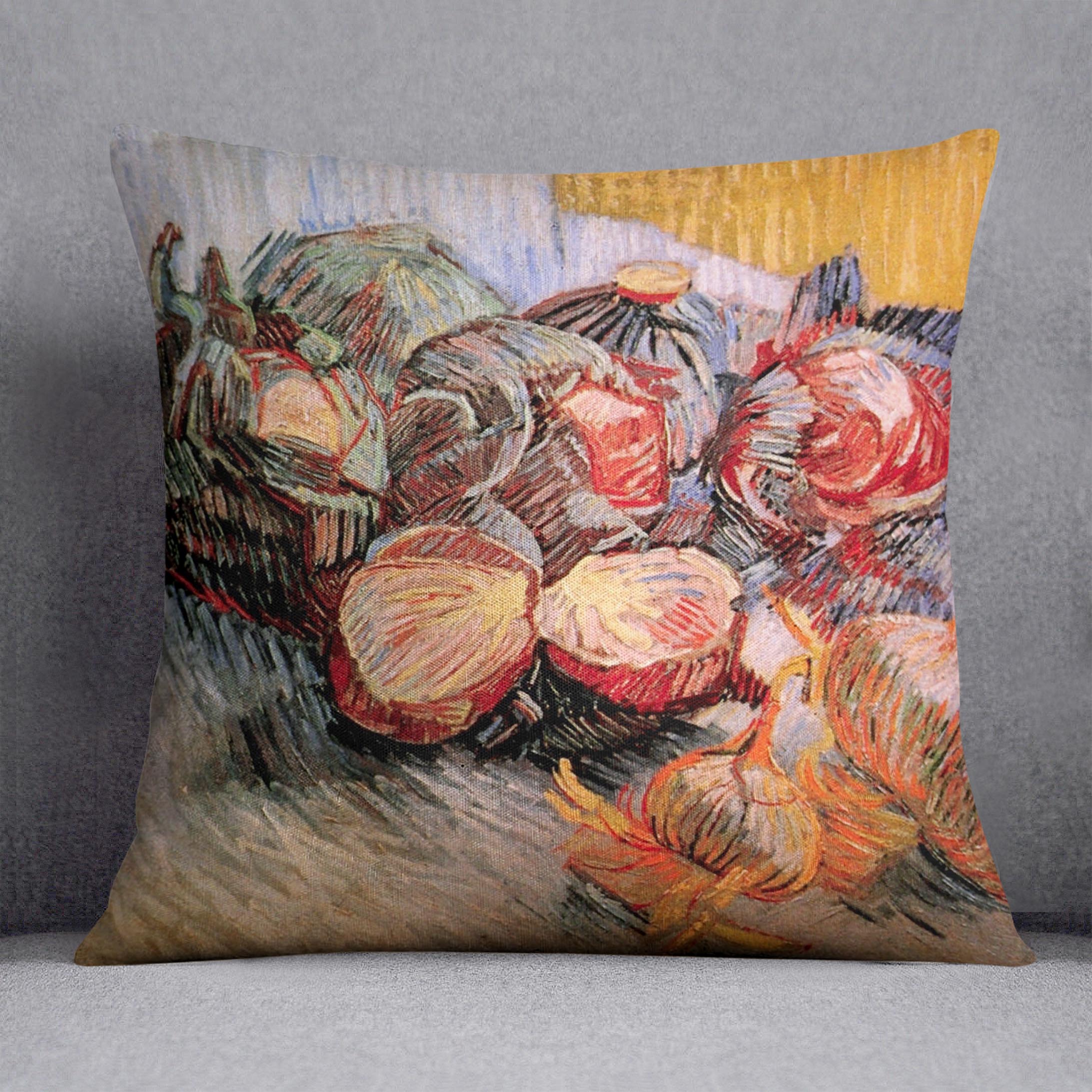 A vibrant cushion featuring Van Gogh's Still Life with Red Cabbages and Onions, made from luxurious vegan faux suede.