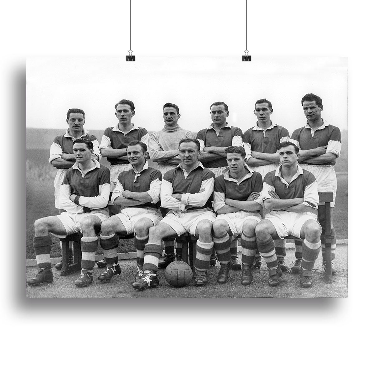 A vintage 1954 team photo of Stirling Albion Football Club displayed on a canvas print, showcasing players in their classic football kits.