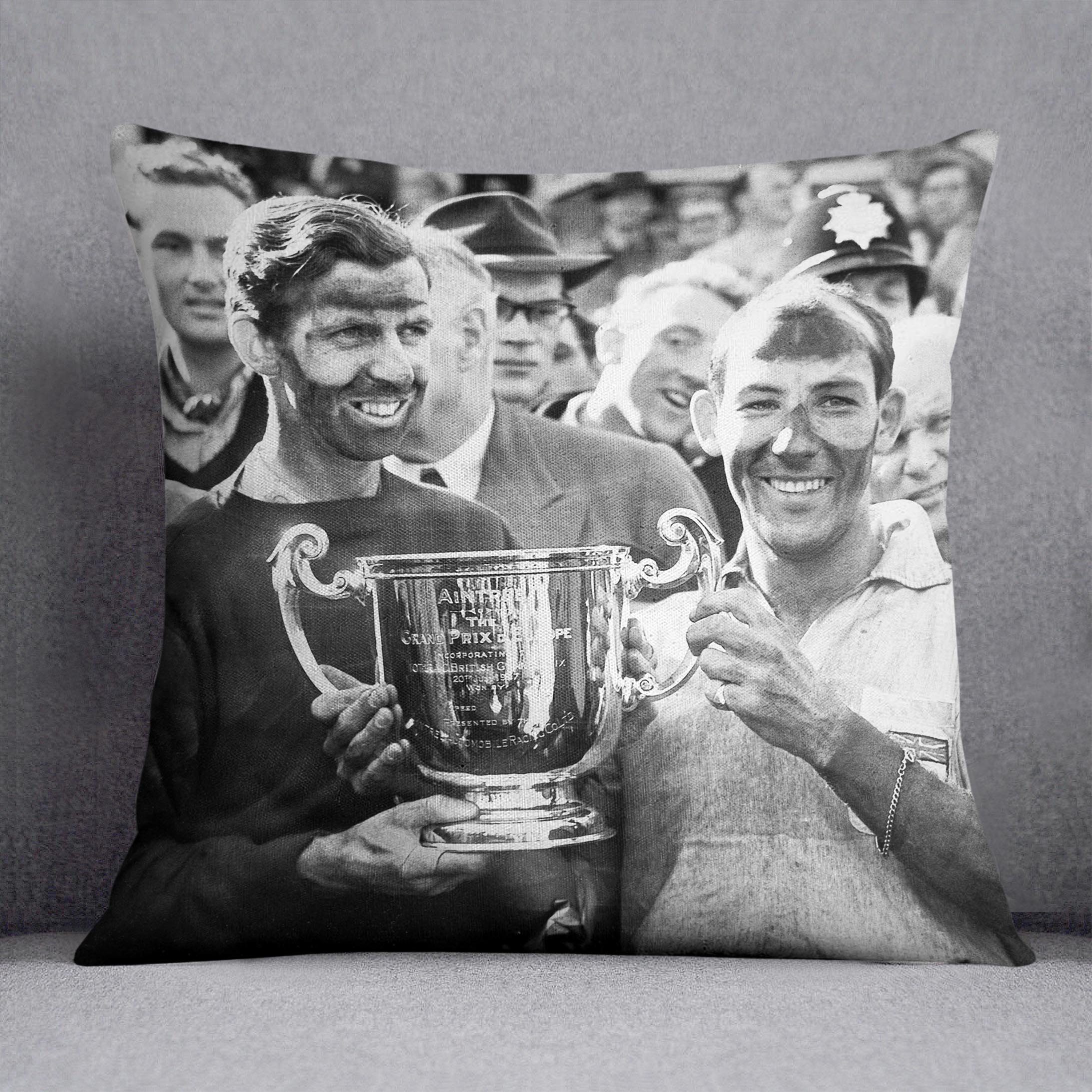 A vibrant abstract cushion featuring Stirling Moss and Tony Brooks design, made from luxurious vegan faux suede with plump filling.