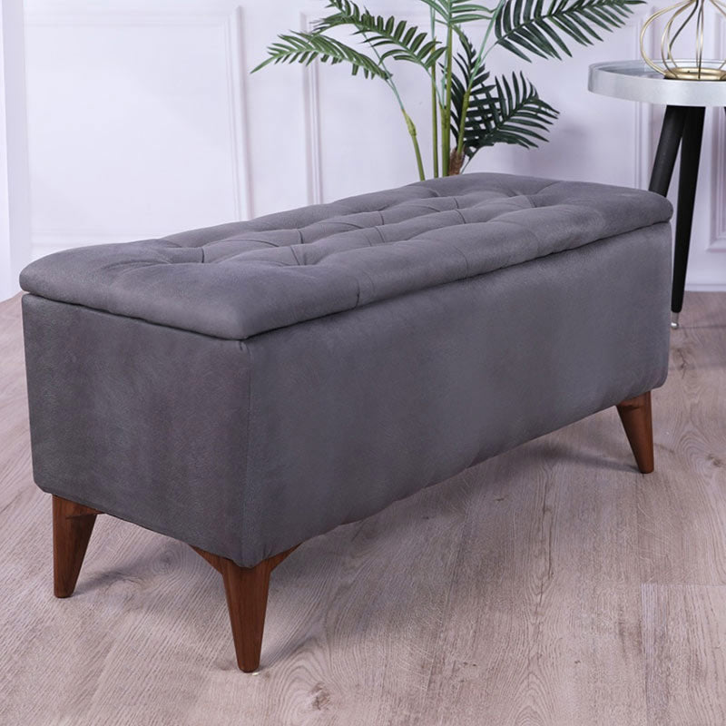 HERMANN Grey Stool with storage space, featuring a stylish fabric upholstery and walnut-colored legs, perfect for home or office use.