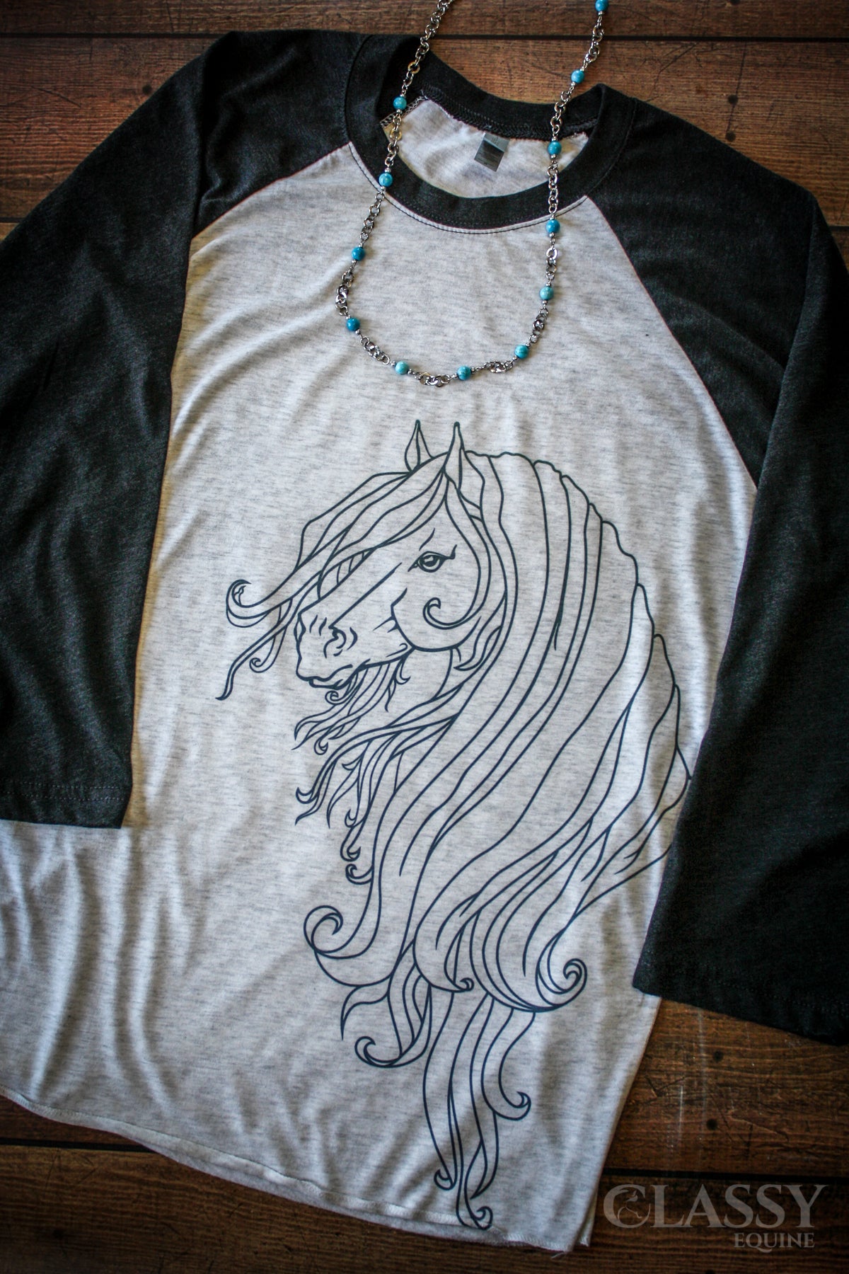 Strength Equestrian Raglan featuring a heather white body and vintage sleeves in assorted colors, perfect for barn life.