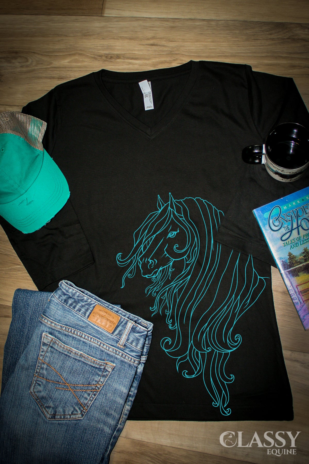 Strength Women's 3/4 Sleeve V Neck Tee in ringspun cotton, featuring a stylish design perfect for mild weather.