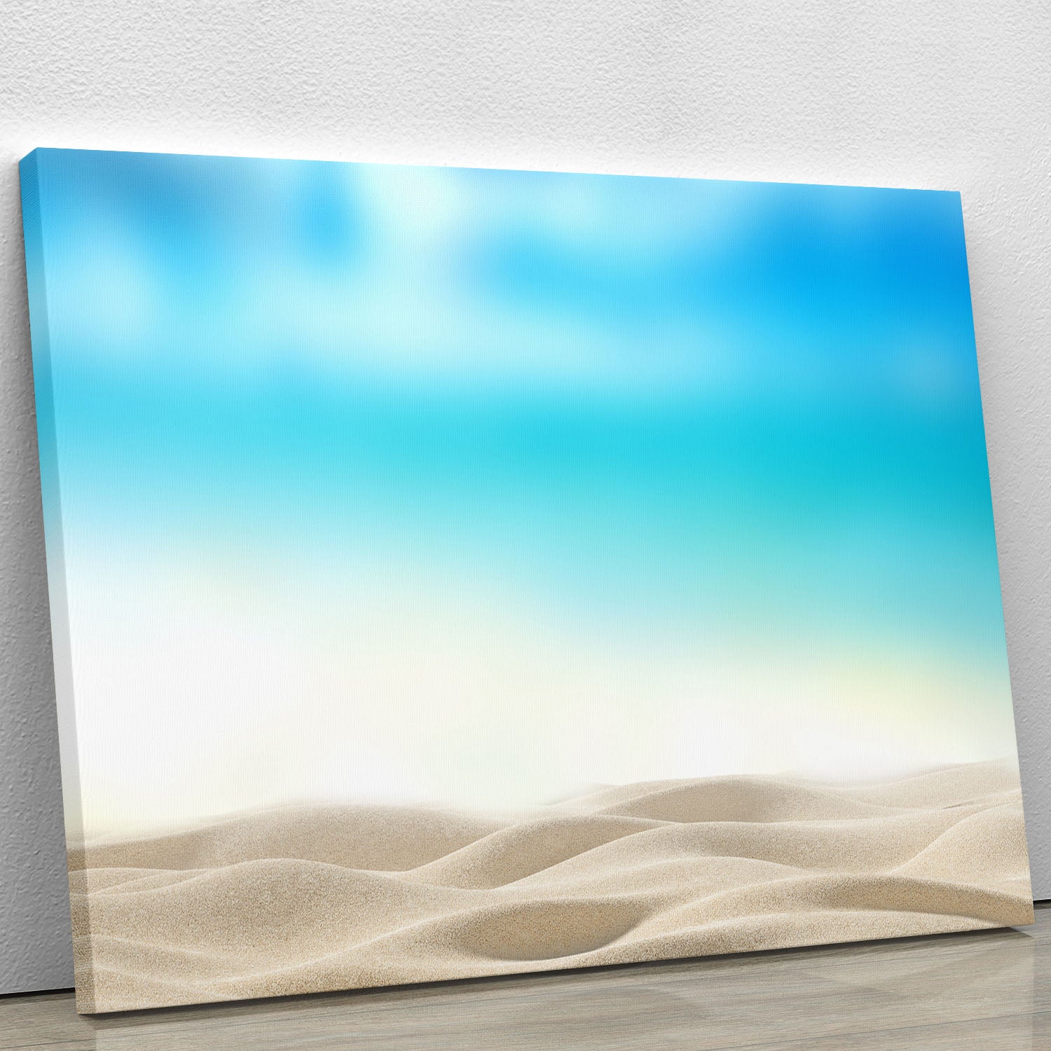 A beautiful canvas print featuring a summer exotic sandy beach with a blurred sea, perfect for home decor.