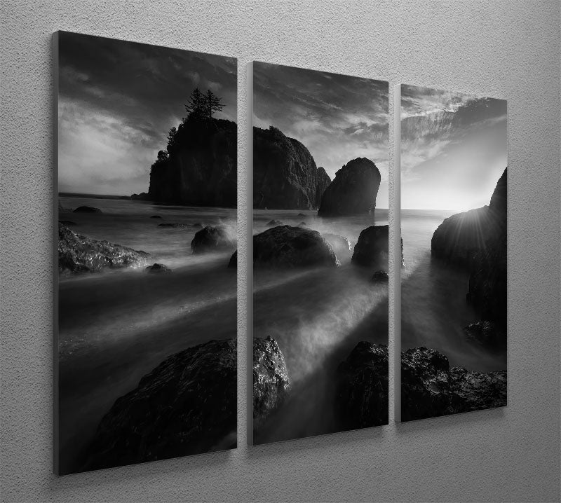 A beautiful 3-panel canvas print featuring sunbeams at the coast, showcasing vibrant colors and serene ocean scenery.