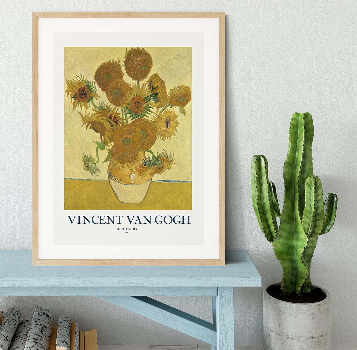 A beautifully framed print of sunflowers in a handmade frame, showcasing vibrant colors and intricate details.