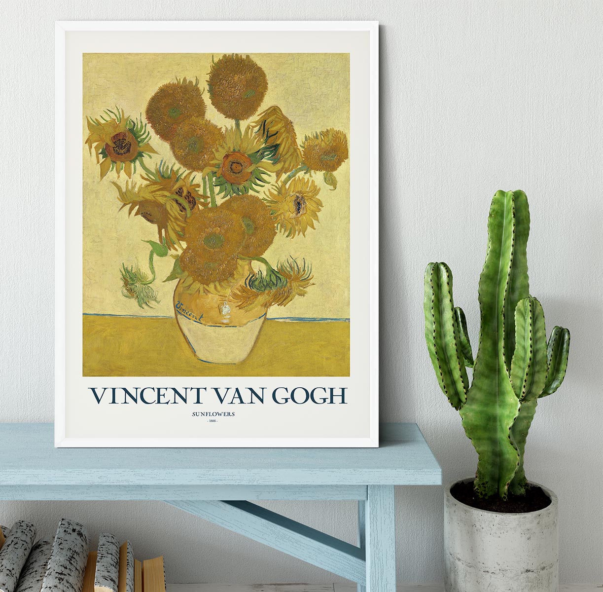 A beautifully framed print of sunflowers in a handmade frame, showcasing vibrant colors and intricate details.