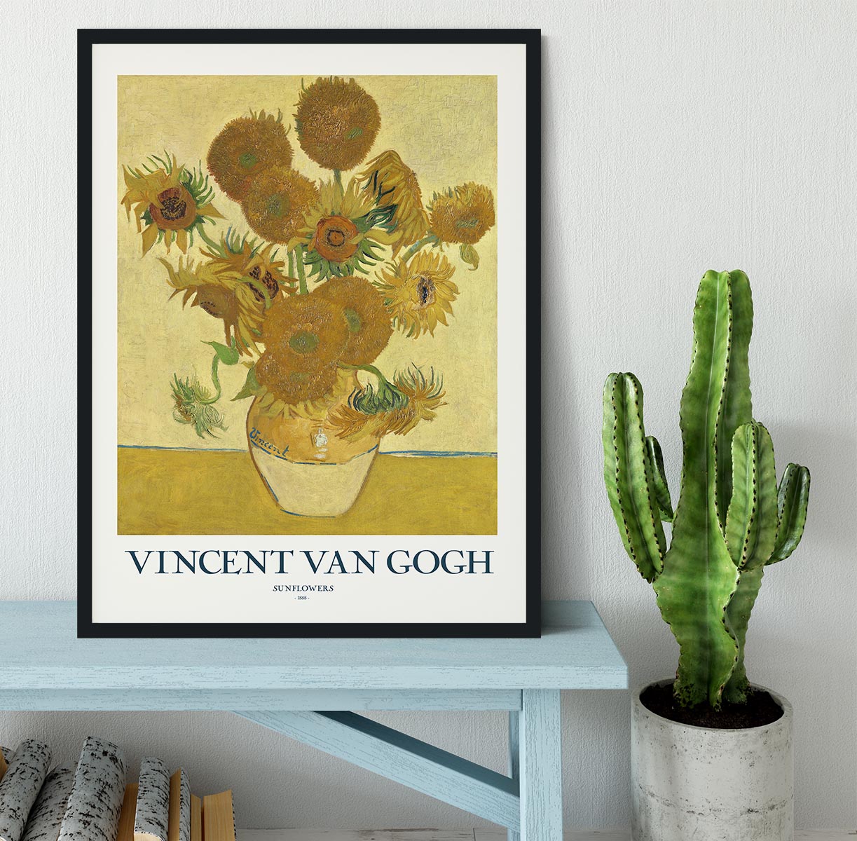 A beautifully framed print of sunflowers in a handmade frame, showcasing vibrant colors and intricate details.