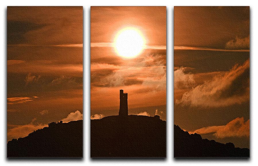 A stunning 3-panel canvas print depicting a sunrise behind Castle Hill, showcasing vibrant colors and intricate details.