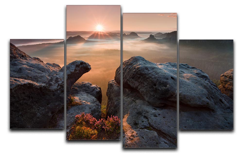 A vibrant 4-split canvas artwork depicting a serene sunrise over rocky terrain, showcasing warm colors and dynamic design.