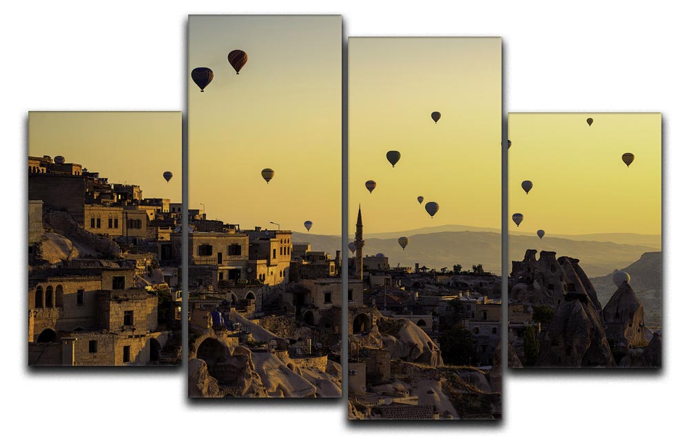 A beautiful 4-panel canvas artwork depicting a vibrant sunrise over Cappadocia's unique rock formations.