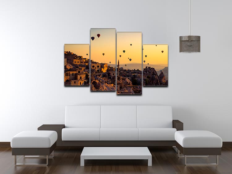 A beautiful 4-panel canvas artwork depicting a vibrant sunrise over Cappadocia's unique rock formations.