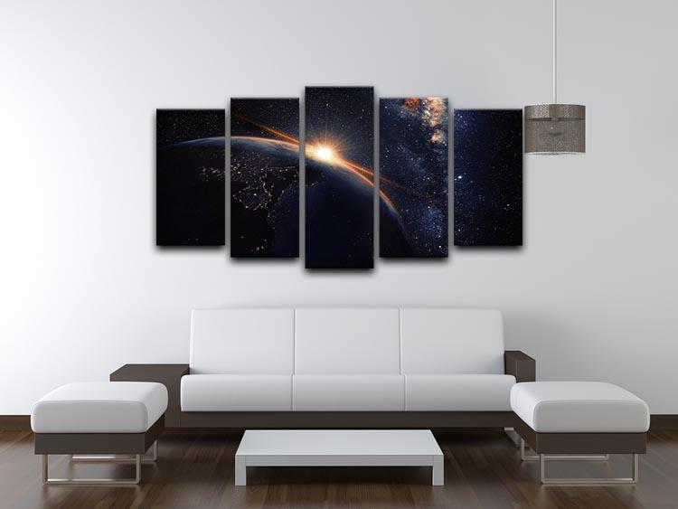 A stunning 5-panel canvas artwork depicting a vibrant sunrise seen from space, showcasing rich colors and dynamic design.