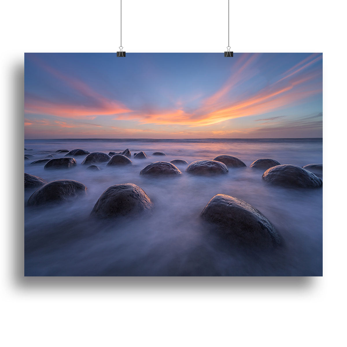 A beautiful canvas print of a sunset at Bowling Ball Beach, showcasing vibrant colors and unique rock formations against a serene ocean backdrop.