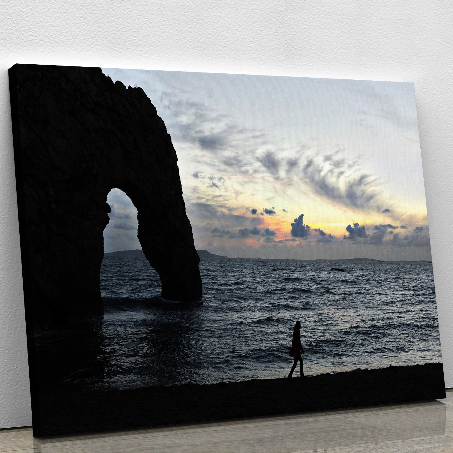 A beautiful canvas print of the sunset at Durdle Door, showcasing vibrant colors and natural beauty.