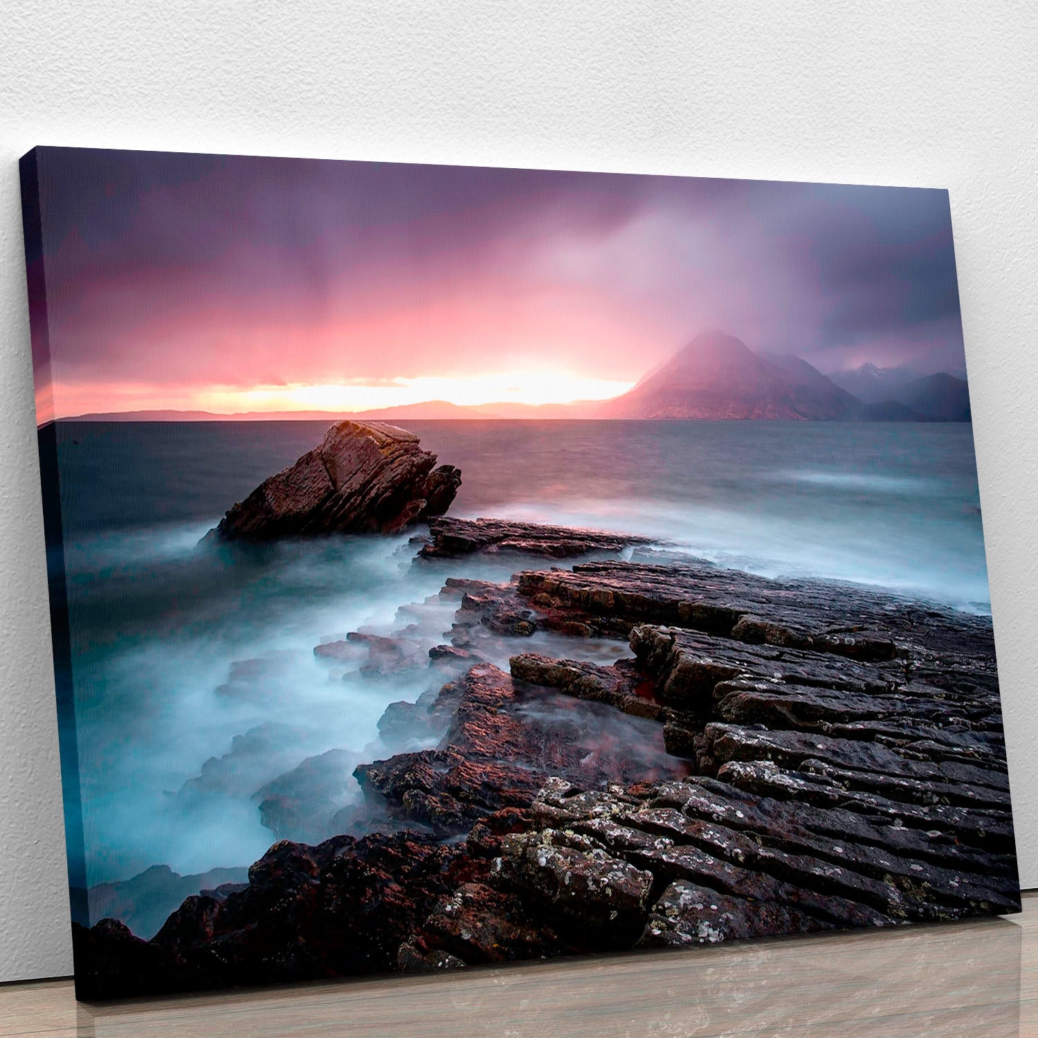 A beautiful canvas print of Sunset At Elgol Beach, showcasing vibrant colors of the sunset over the tranquil beach landscape.