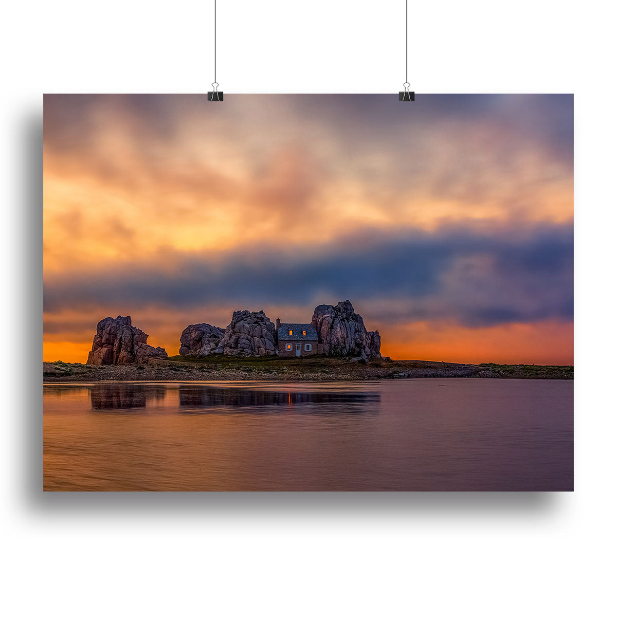 A beautiful canvas print of a sunset over Plougrescant, showcasing vibrant colors and serene landscape details.