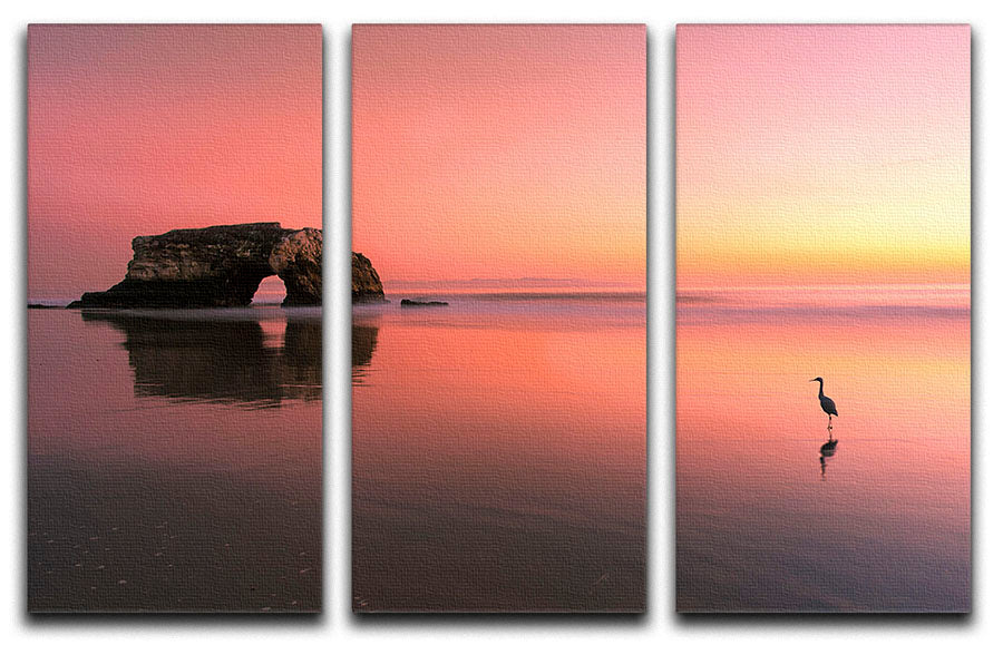 Three-panel canvas print featuring a stunning sunset at the Natural Bridge, showcasing vibrant colors and natural beauty.