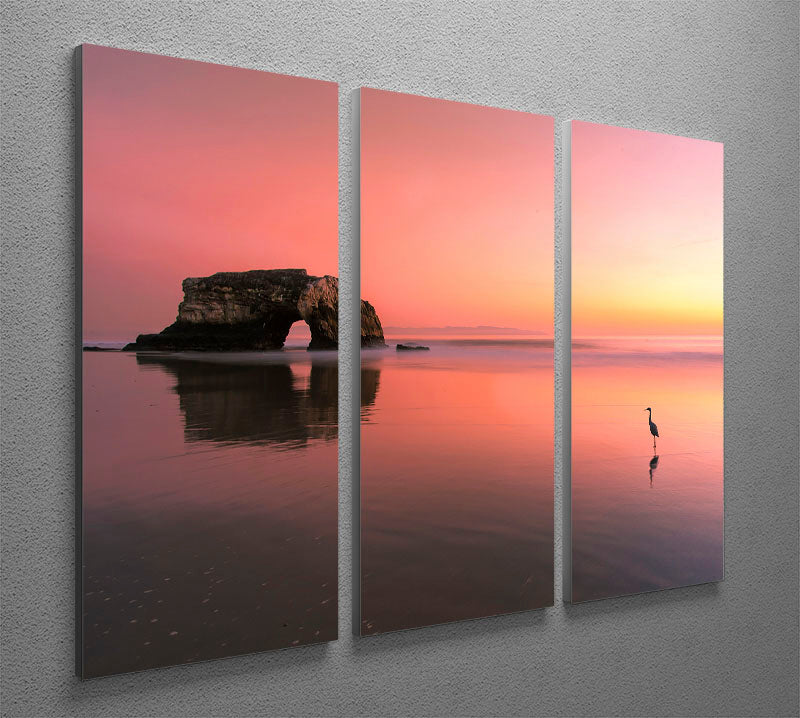 Three-panel canvas print featuring a stunning sunset at the Natural Bridge, showcasing vibrant colors and natural beauty.