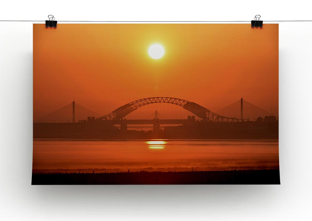 A vibrant canvas print depicting a sunset over the Mersey River, showcasing rich colors and serene landscape.