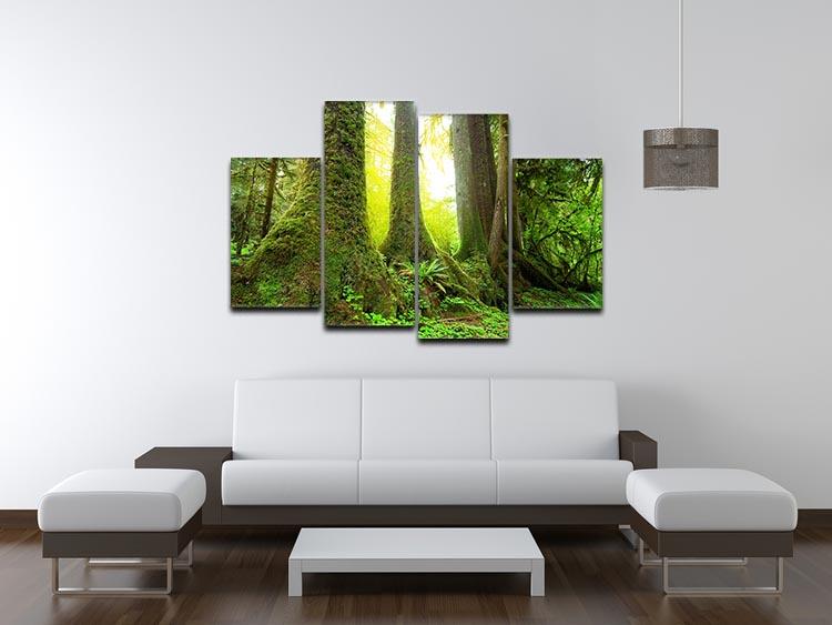 A beautiful 4-panel canvas artwork depicting sunlight filtering through a lush green forest, creating a serene and vibrant atmosphere.