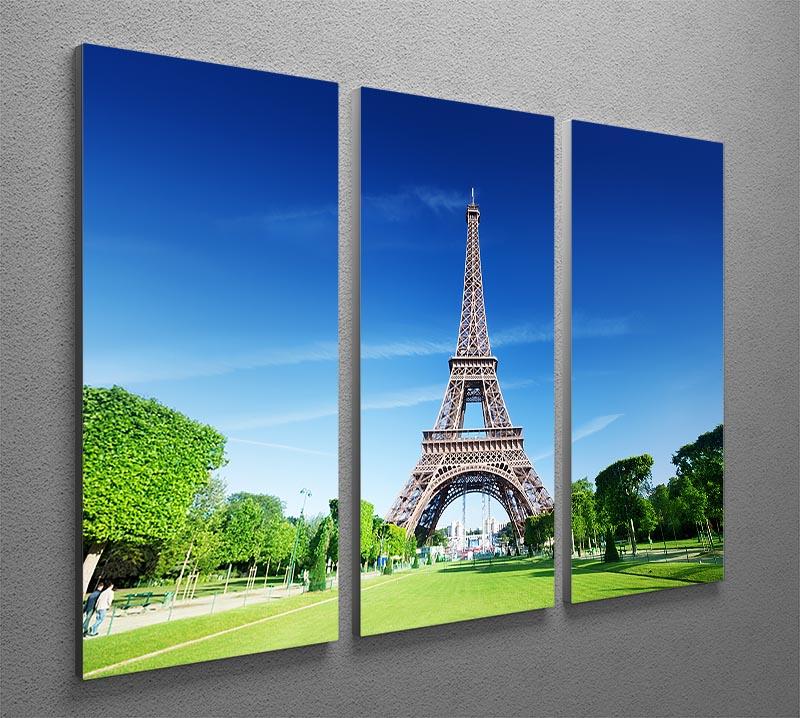 A beautiful 3-panel canvas print featuring the Eiffel Tower under a sunny sky, perfect for home decor.