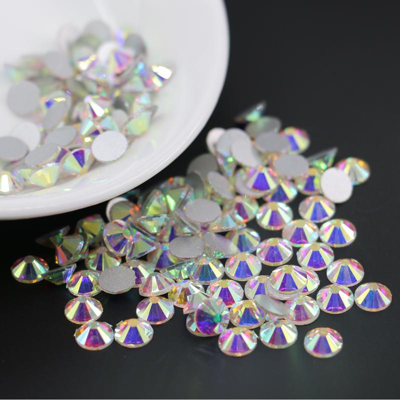 Super Glitter Nail Art Rhinestones in Crystal AB color, showcasing various sizes from ss3 to ss30, perfect for nail art and DIY projects.