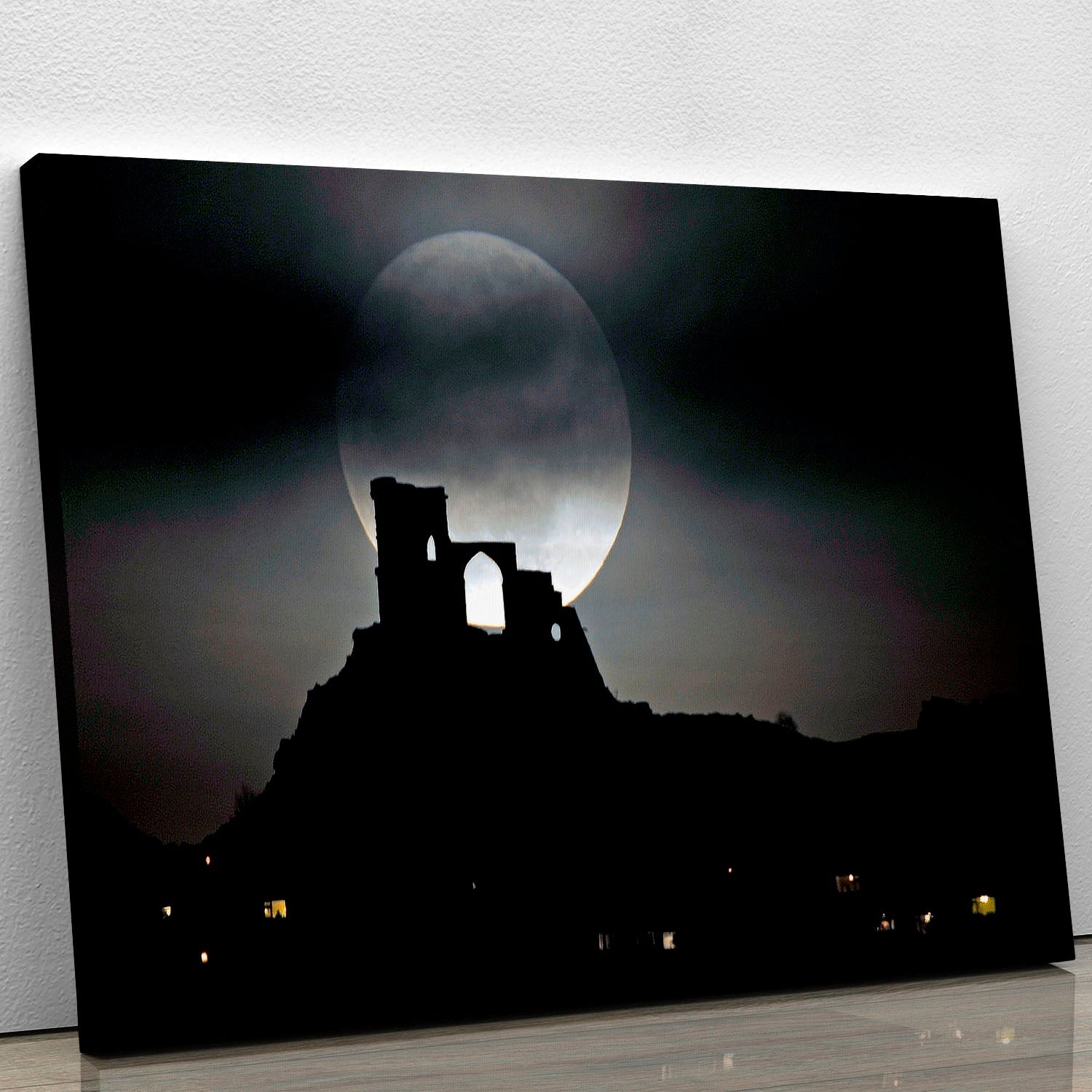 A beautiful canvas print of the Super Moon illuminating Mow Cop, showcasing vibrant colors and intricate details.