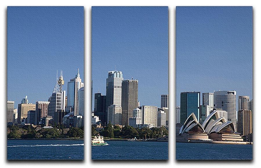 A stunning 3-panel canvas print featuring the Sydney cityscape against a bright blue sky, perfect for home or office decor.