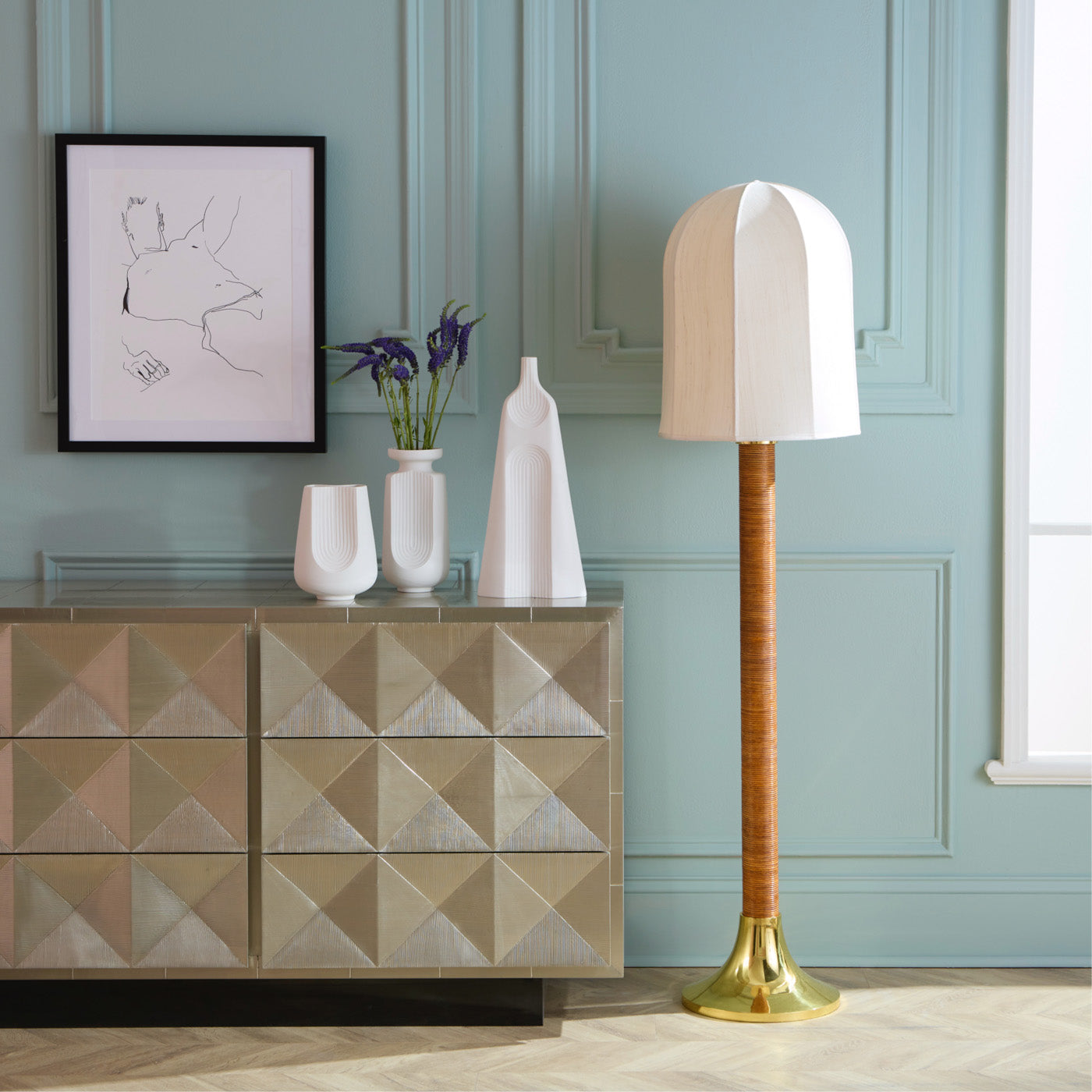 Talitha Six-Drawer Dresser featuring hand-hammered nickel-plated metal with a scratched texture, showcasing a geometric stud pattern and glossy blue interiors.