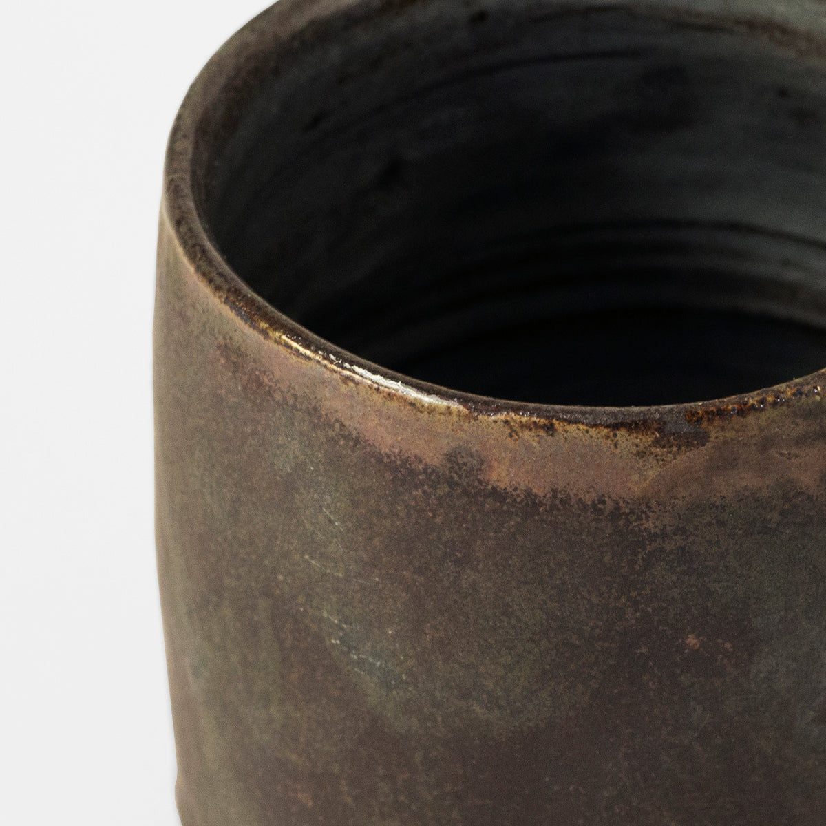 Handmade TANG Ceramic Mug in Black Patina, showcasing unique design and artisanal craftsmanship by Gunvor Tangrand.