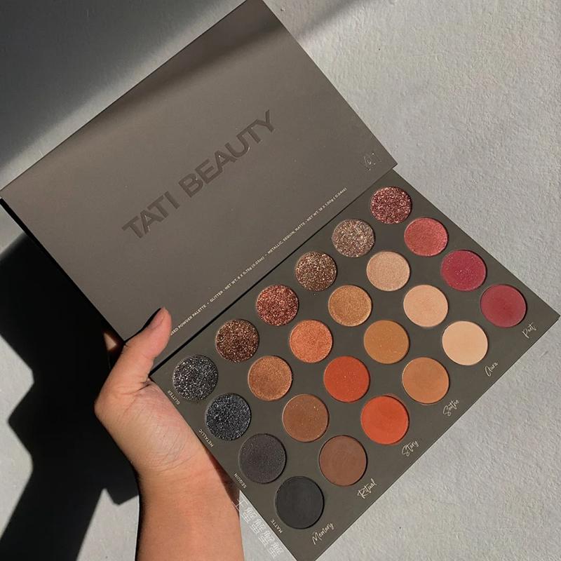 TATI BEAUTY matte eyeshadow powder palette featuring 24 vibrant shades in a sleek design, perfect for creating various eye makeup looks.