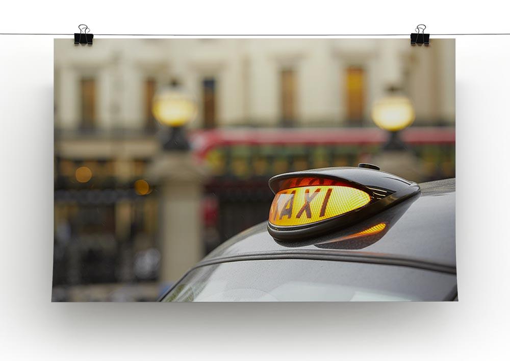 Taxi car selective focus canvas print showcasing urban life with vibrant colors and detailed design.
