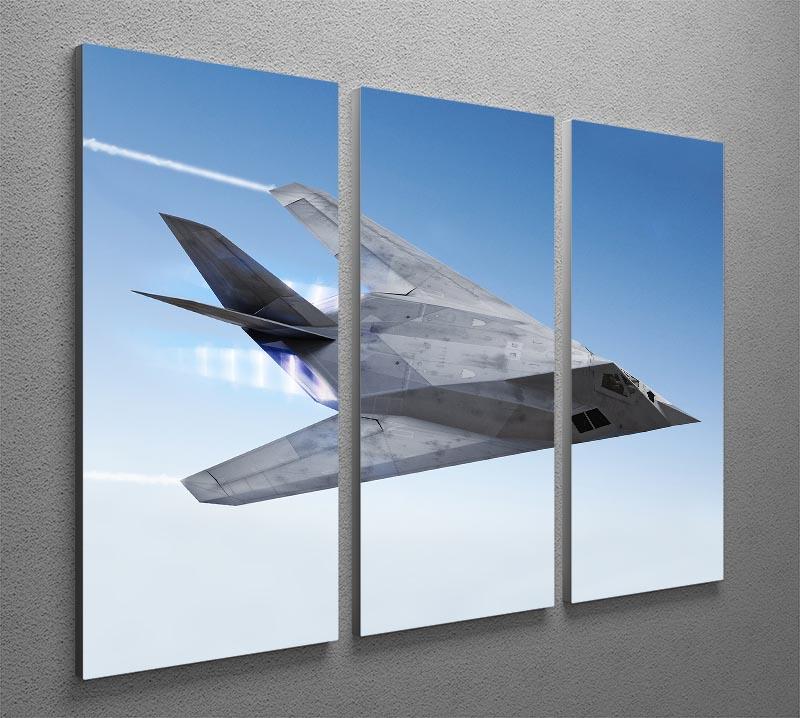 A stunning 3-panel canvas print featuring a stealth aircraft streaking through a clear blue sky, perfect for modern decor.